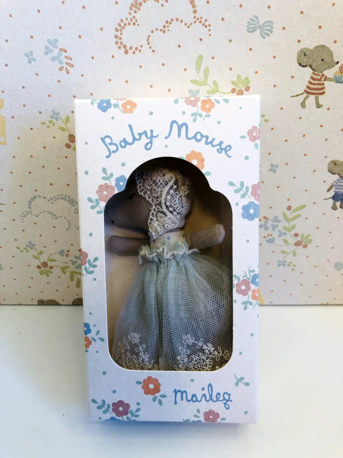 Baby mouse in gown