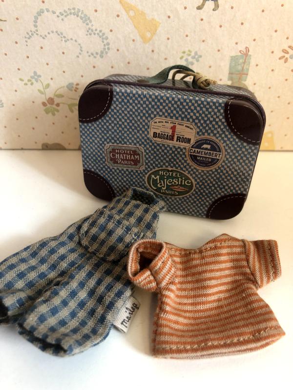 OVERALLS AND SHIRT IN SUITCASE